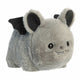 Plush toy with bat-like features on a white background