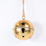 Gold bell with star design on a white background
