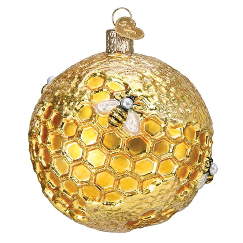 Decorative ornament resembling a honeycomb with a bee on a white background