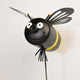 Bee-shaped art with black and yellow colors on a white background