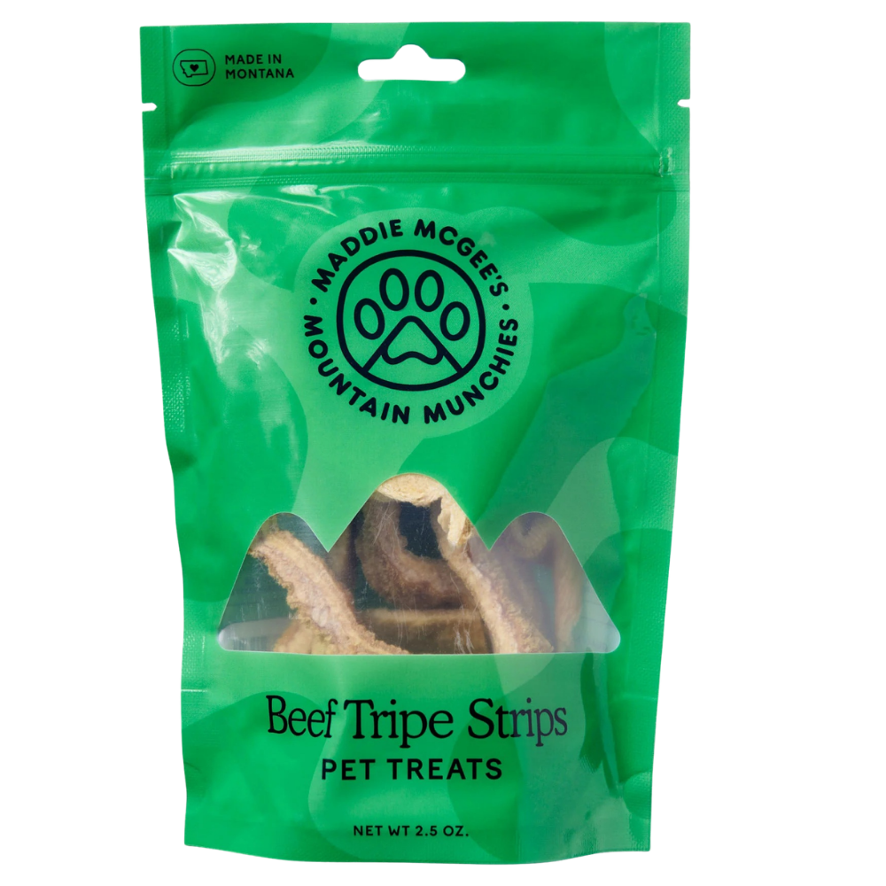 Green package of Maddie McGee's Mountain Munchies Beef Tripe Strips pet treats on a white background