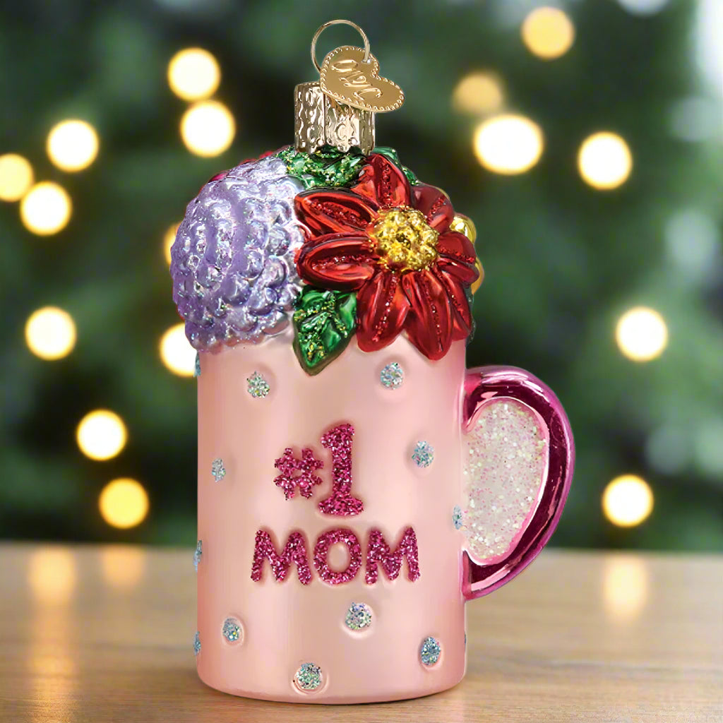 Celebrate Mom this Holiday season with the Best Mom Mug Ornament by Old World Christmas.