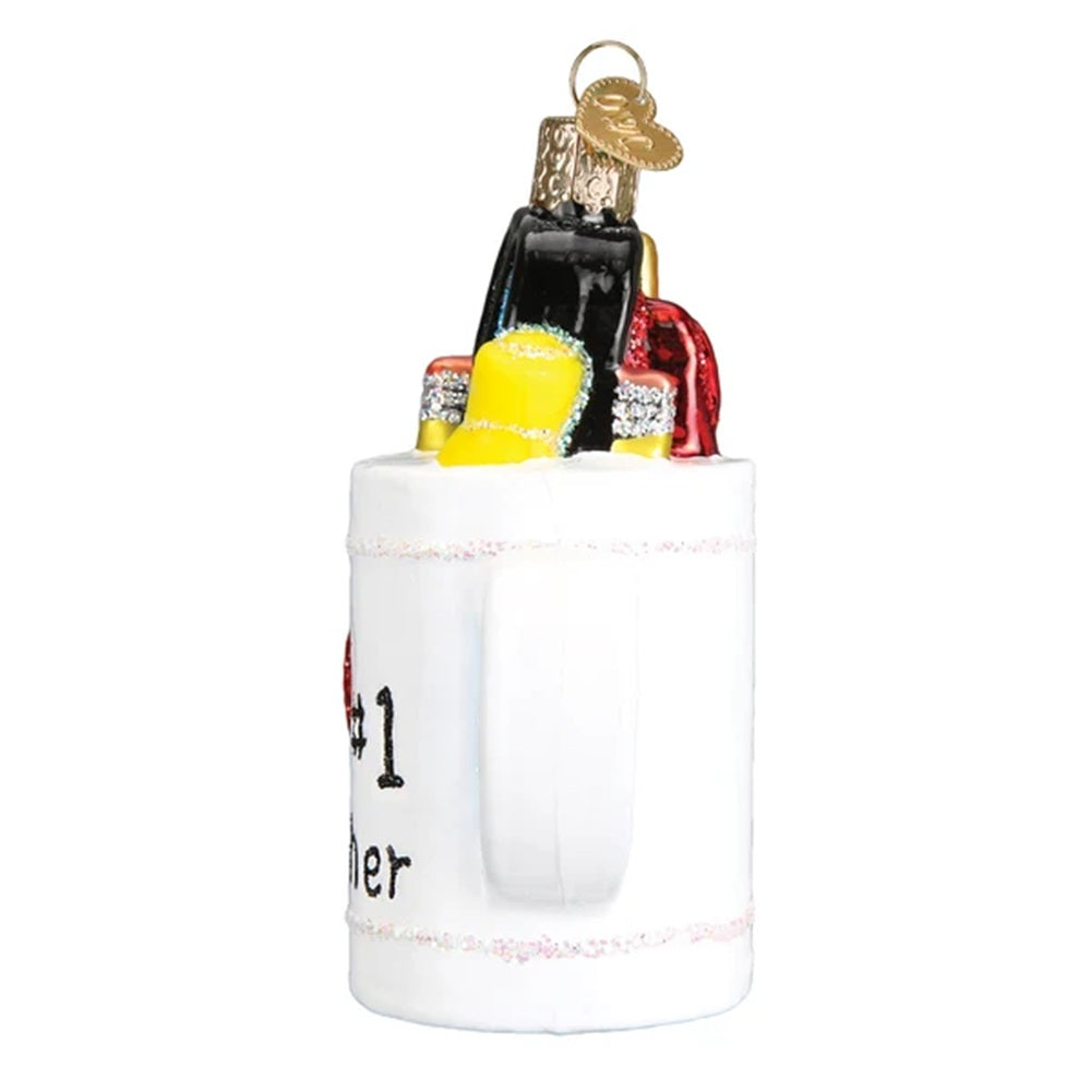 Decorative ornament of a mug with tools on a white background