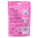 Pink package of Manna Munchies dog treats with text and graphics on a white background