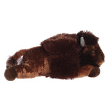 Plush toy bison on a white background on its side