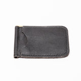 A black textured leather money clip wallet with a gold-tone metal clip, shown on a plain white background.