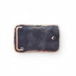 bobcat bronze belt buckle on white background