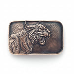 bobcat bronze belt buckle on white background