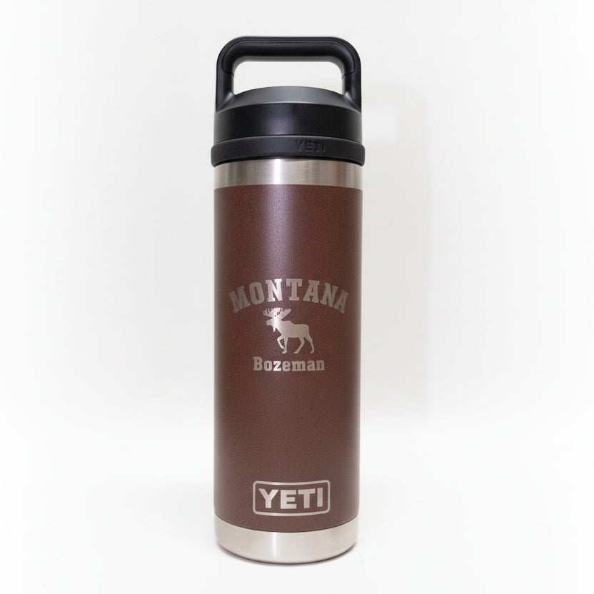 Brown YETI mug with 'Montana Bozeman' text and moose logo on a white background