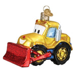 Decorative glass ornament of a yellow bulldozer with a red blade on a white background
