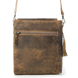 A brown distressed leather crossbody bag with a zippered pocket, adjustable shoulder strap, and a tassel detail on the side, shown against a plain white background.