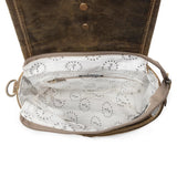 Brown leather bag with white interior lining on a white background