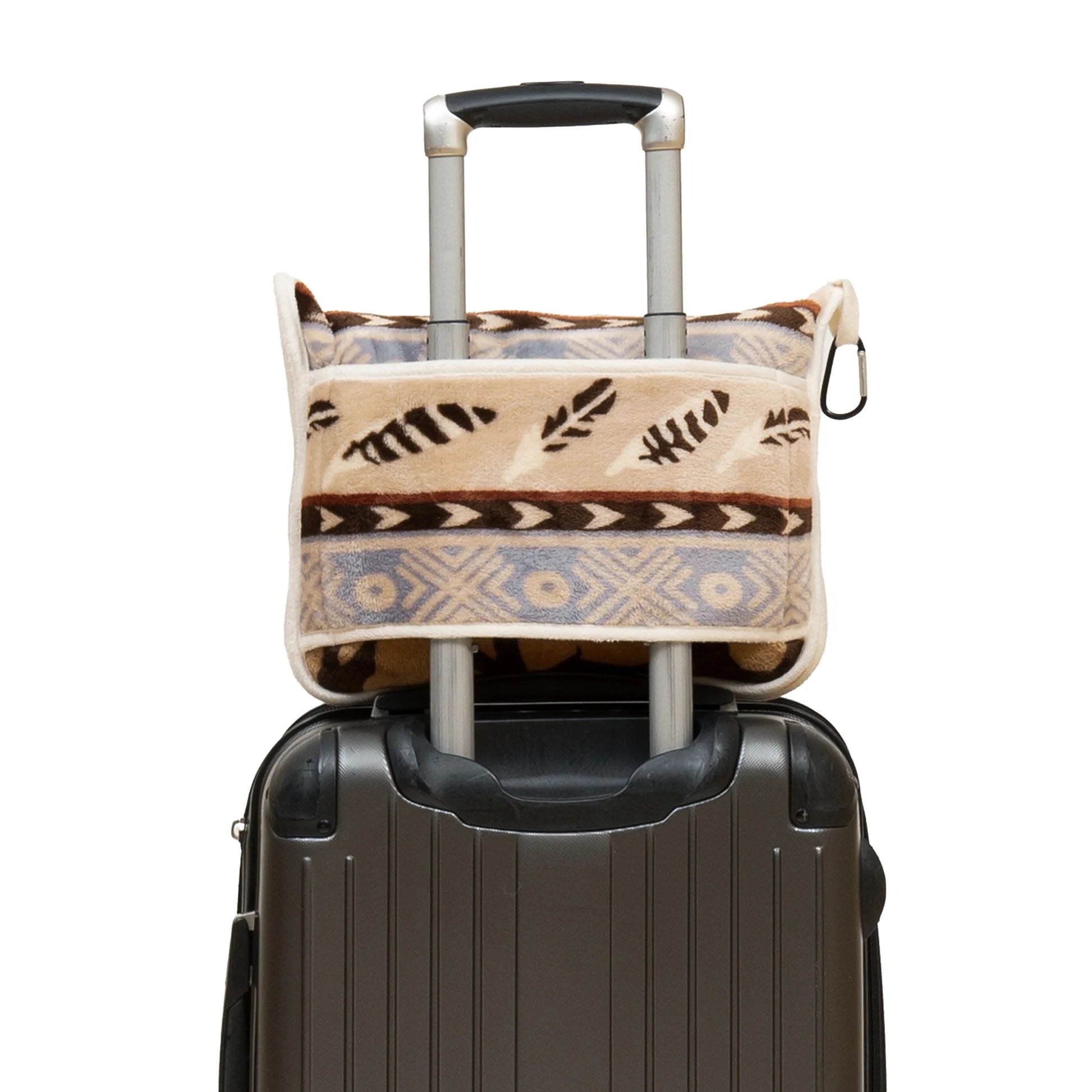 Patterned luggage cover on a suitcase with a white background