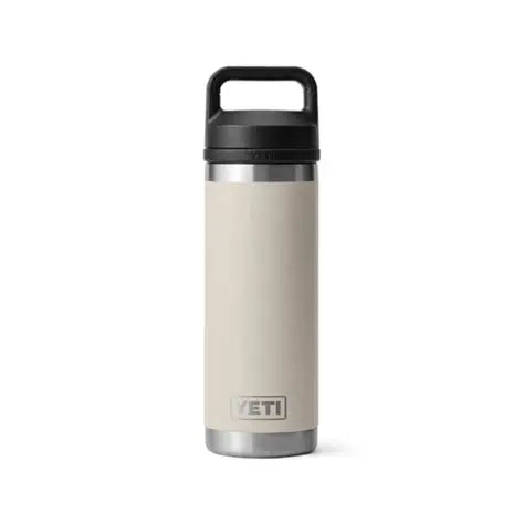 Beige insulated bottle with black lid on a white background