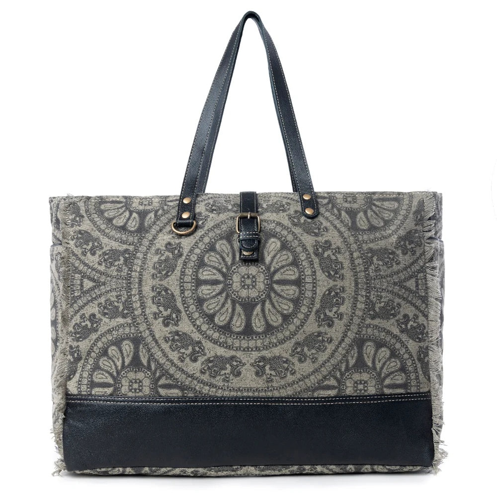 Patterned tote bag with black accents on a white background
