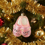 Pink glittery cat shoes ornament with 'Cat Lady' text on a Christmas tree.