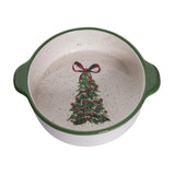 Ceramic baking dish with a Christmas tree and bow design on a white background
