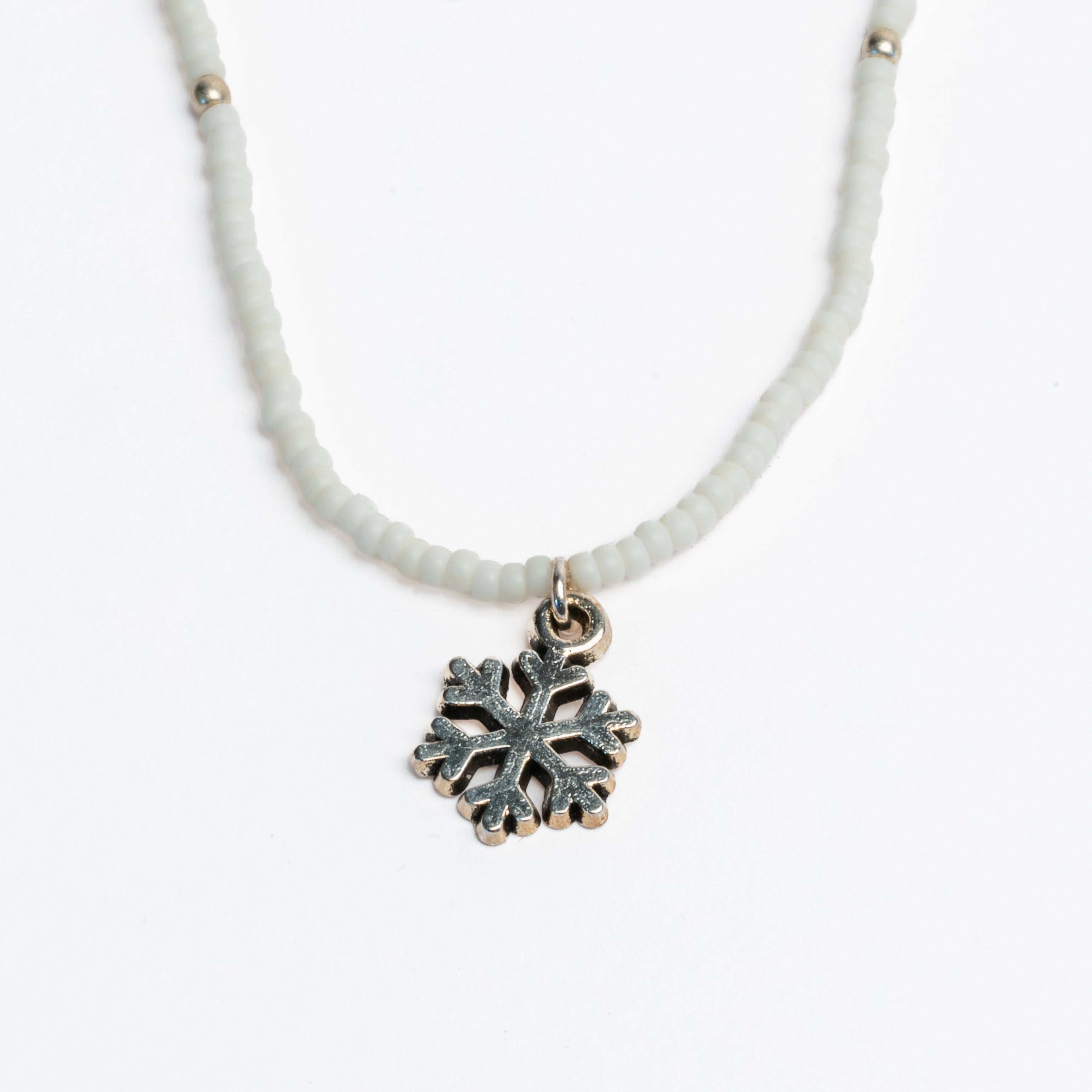 Creamy White Snowflake Stretchy Seed Bead Necklace by Lady Bird Market