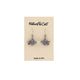 A pair of silver-toned buffalo dangle earrings displayed on a beige Nature's Cast brand card that reads 'Made in USA'.
