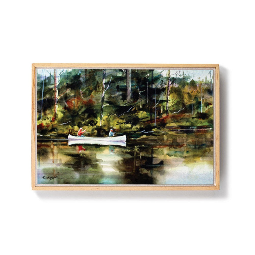 Dean Crouser Montana Wall Art, Two fisherman canoeing on a reflective river in a forest