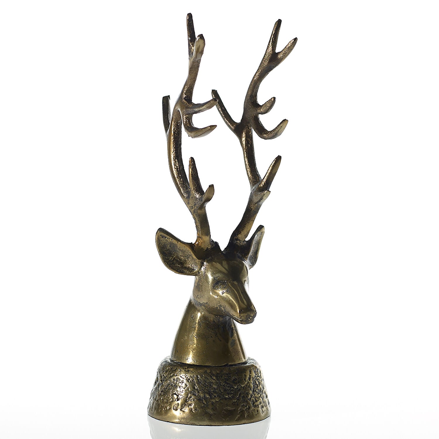 Bronze deer head ornament on a white background