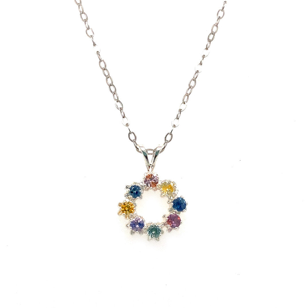 Necklace with a colorful circular pendant on a white background