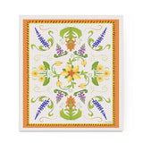 Decorative kitchen towel with floral pattern on a white background