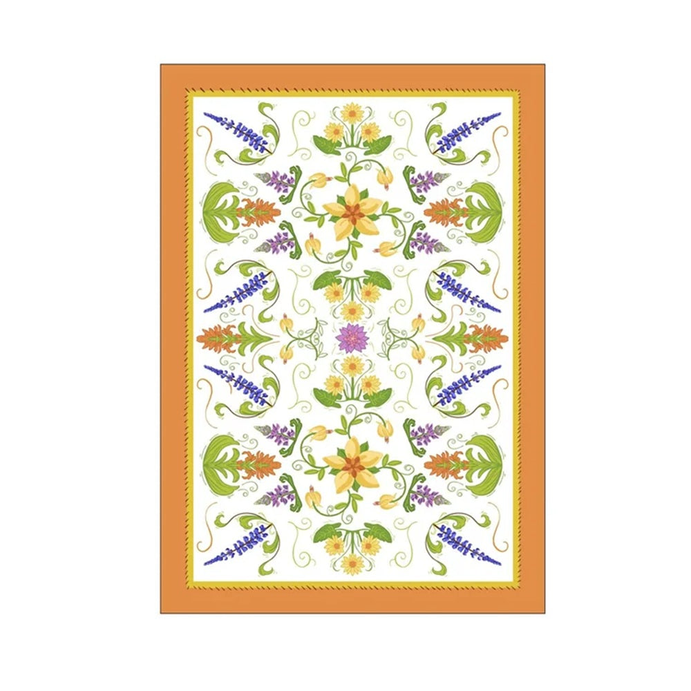 A rectangular decorative print or tile featuring a symmetrical floral pattern with yellow flowers, purple and orange blossoms, green leaves, and swirling vines on a white background, framed by a warm orange border.