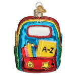 Colorful backpack ornament with stationery items on a white background