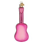 Pink glass guitar ornament on a white background