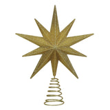 Gold glittery star-shaped Christmas tree topper