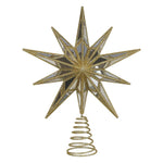 Gold star-shaped Christmas tree topper on a white background
