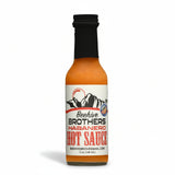 Bottle of Beehive Brothers Habanero Hot Sauce on a white background