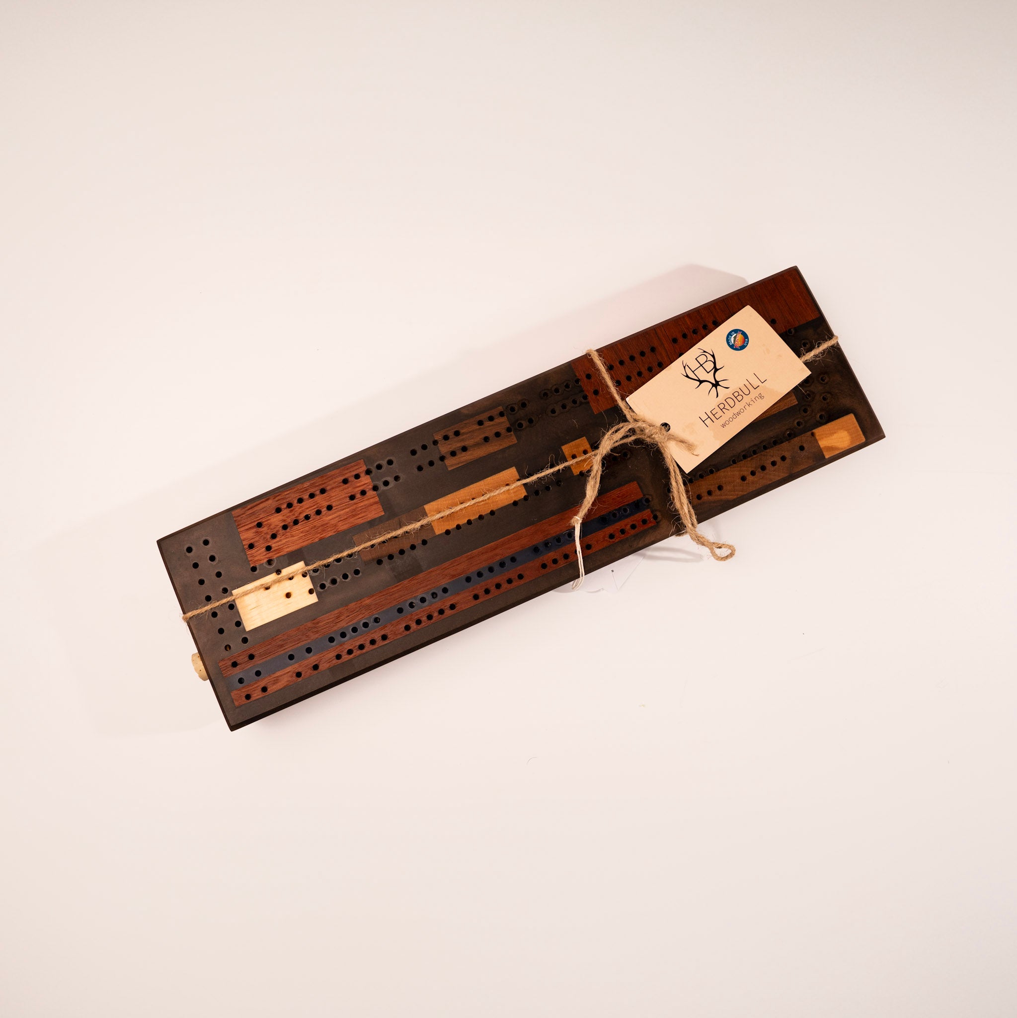 Epoxy and Hardwood Cribbage Board by Herdbull Woodworking
