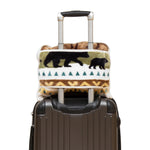 Luggage with a cover featuring bear designs on a white background