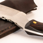 Close-up of a Montana knife with a wooden handle on a white background