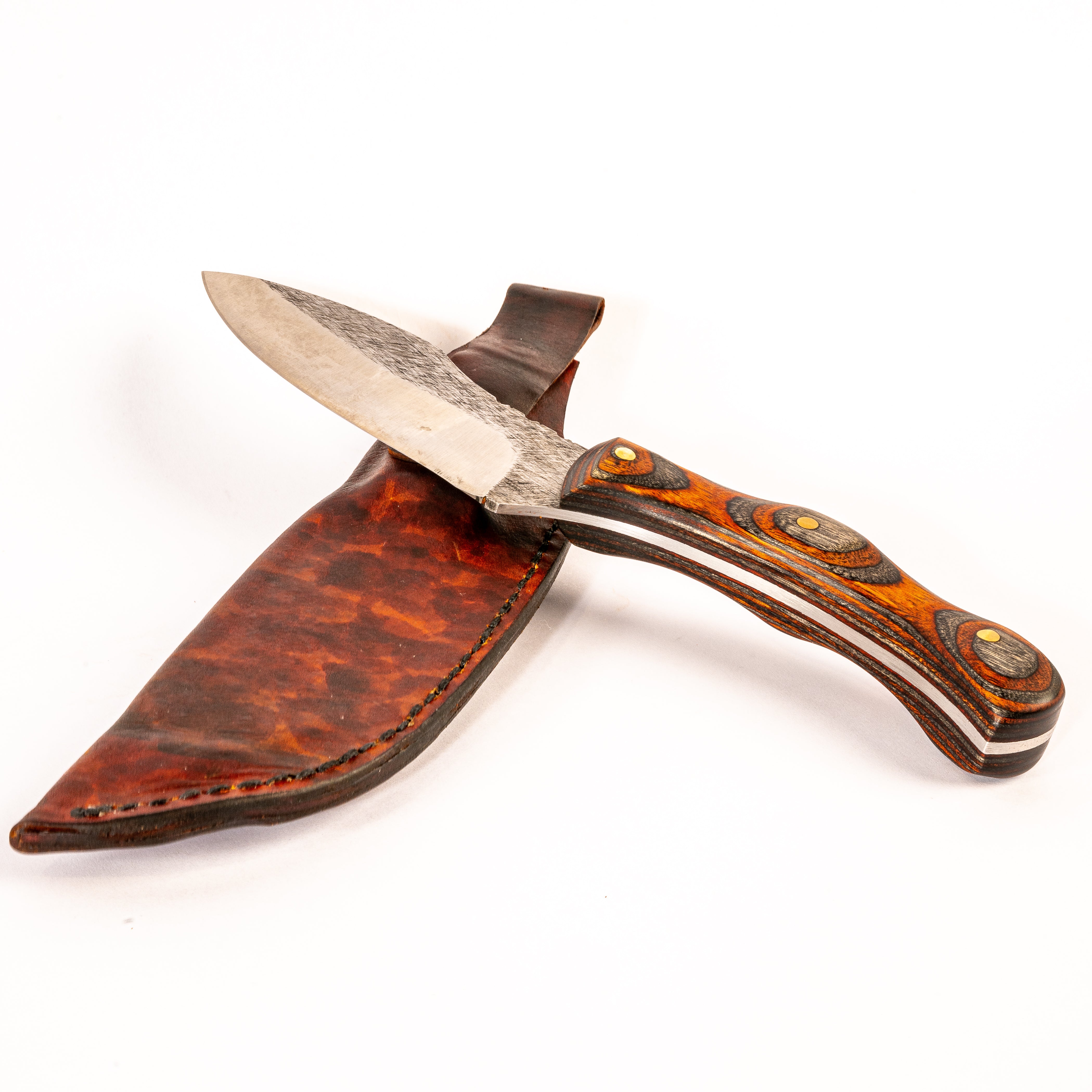 Knife with wooden handle and leather sheath on a white background