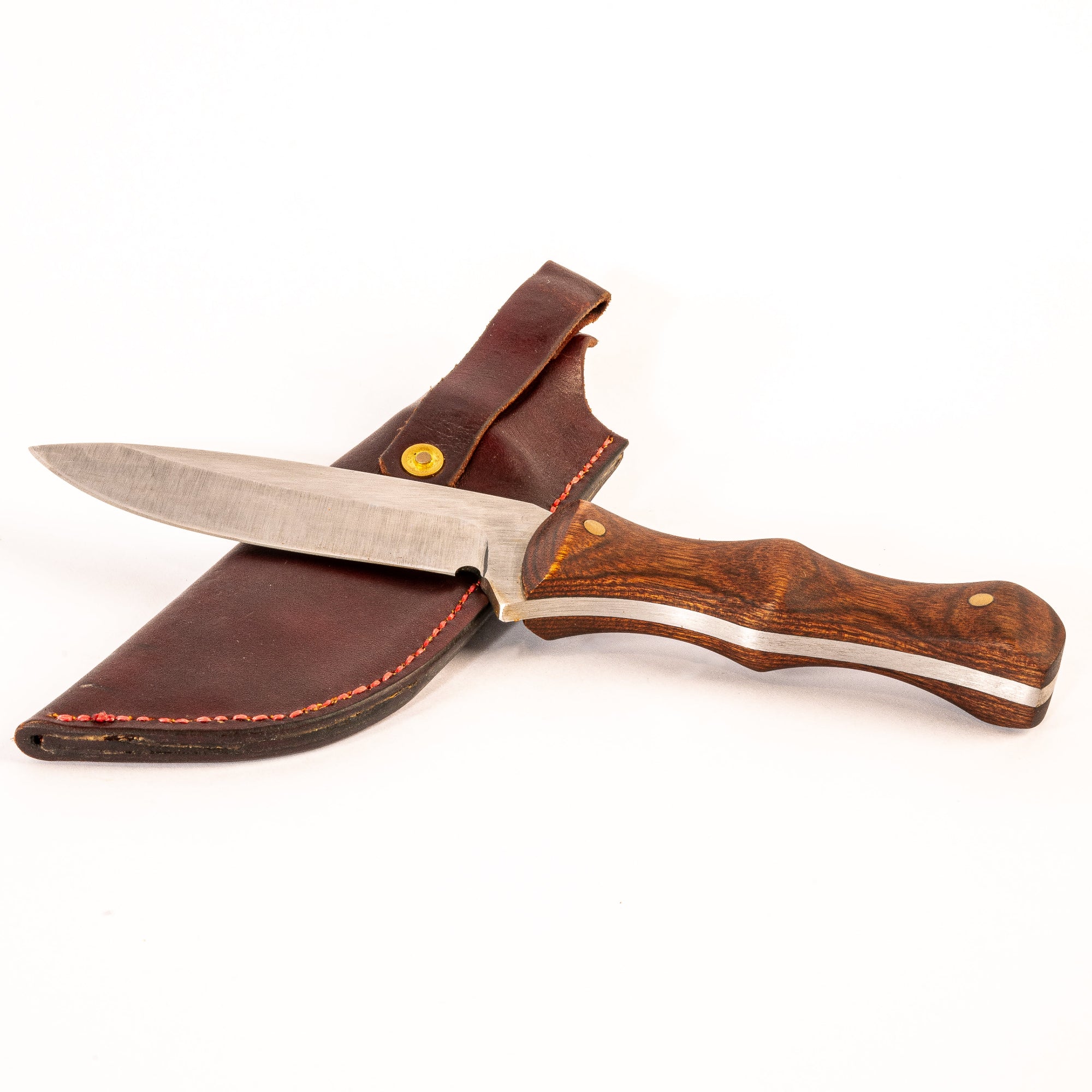 Knife with wooden handle and leather sheath on a white background
