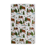 Patterned fabric with bears, moose, and trees on a white background