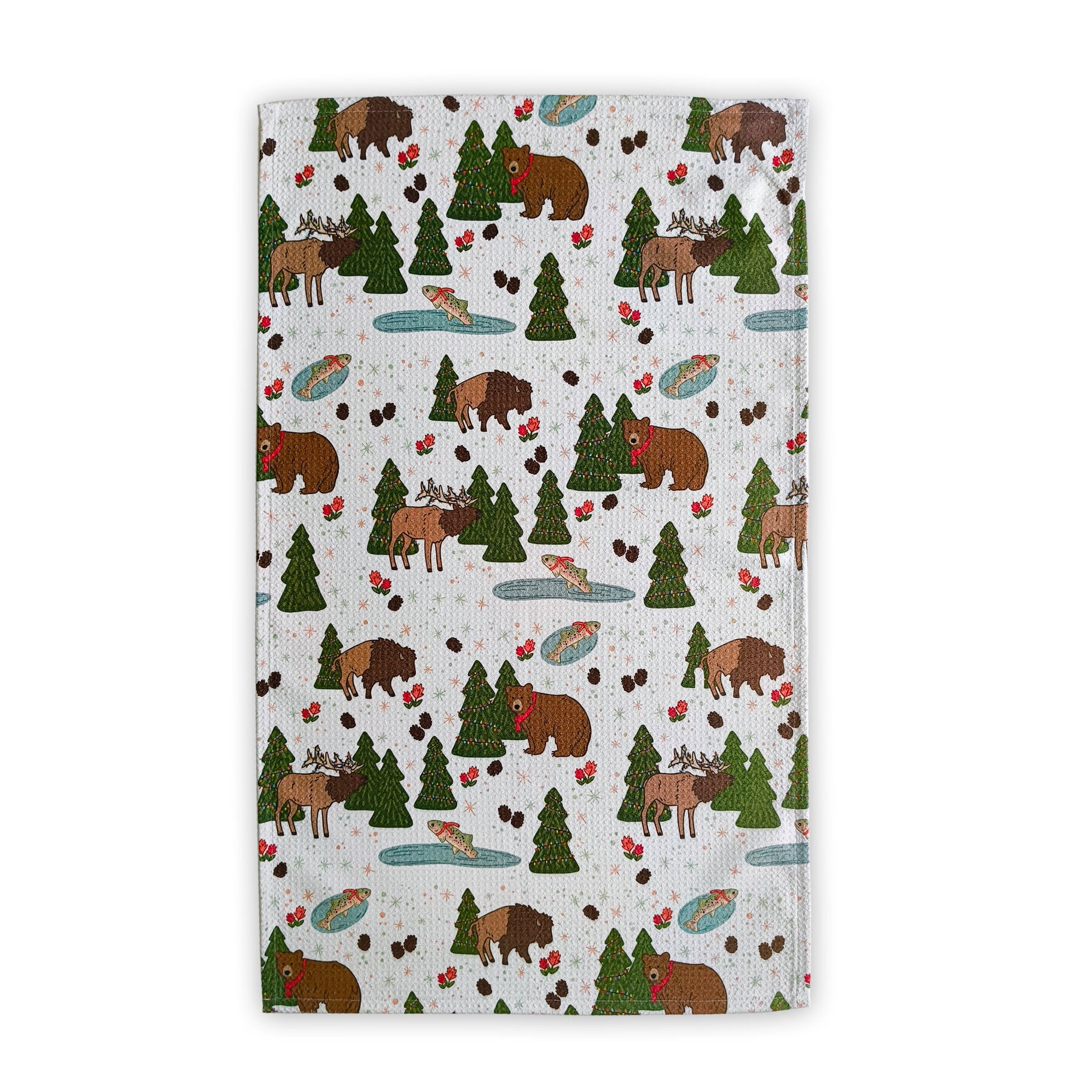 Patterned fabric with bears, moose, and trees on a white background