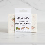 Packaging of Corvidae compostable pop-up sponges on a wooden surface