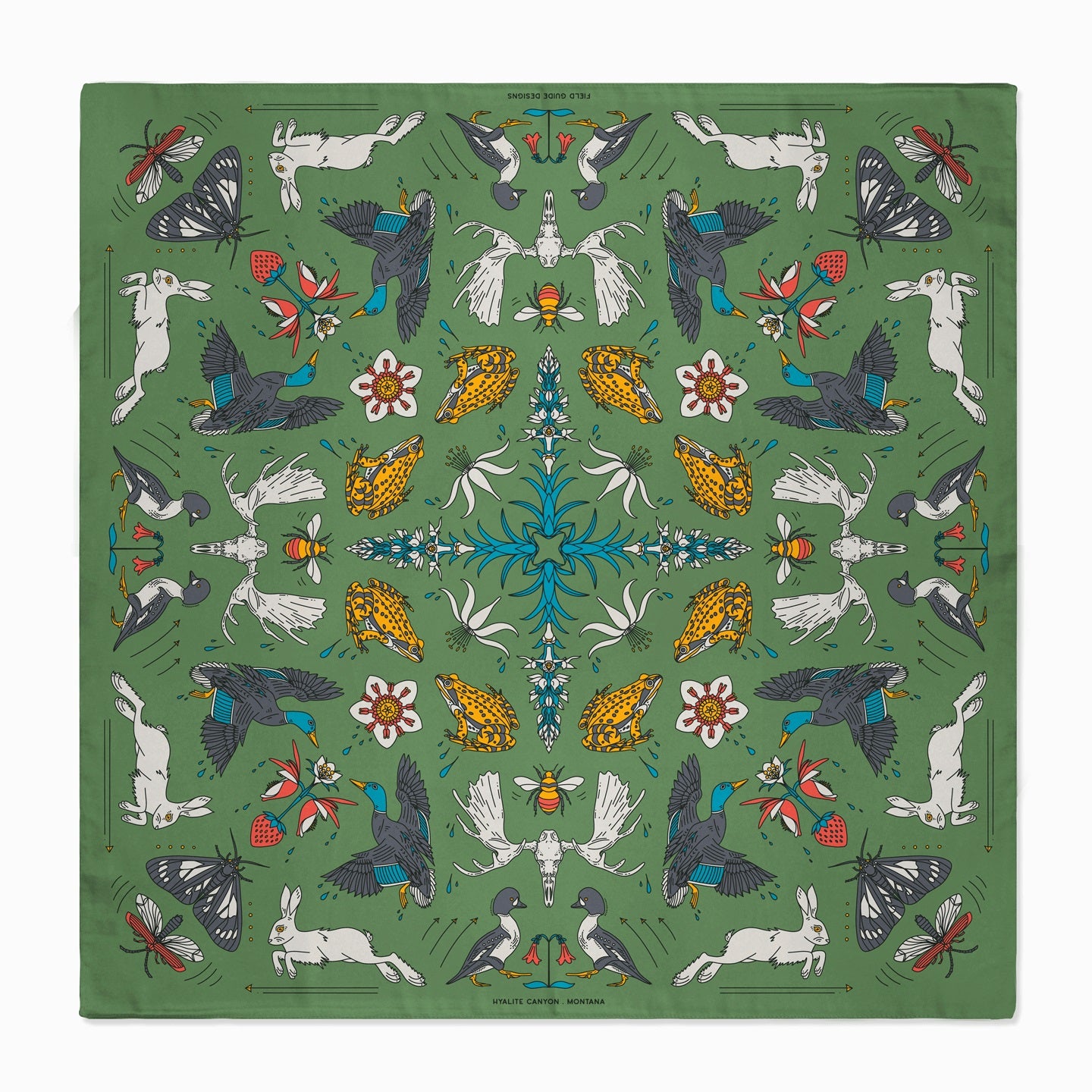 Decorative green fabric with intricate patterns of animals, insects, and flowers.