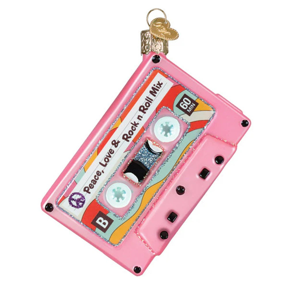 Decorative ornament shaped like a pink cassette tape with 'Peace Love & Rock n Roll Mix' text on a white background.