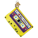 Decorative ornament shaped like a cassette tape with 'I love 80s music' text on a white background