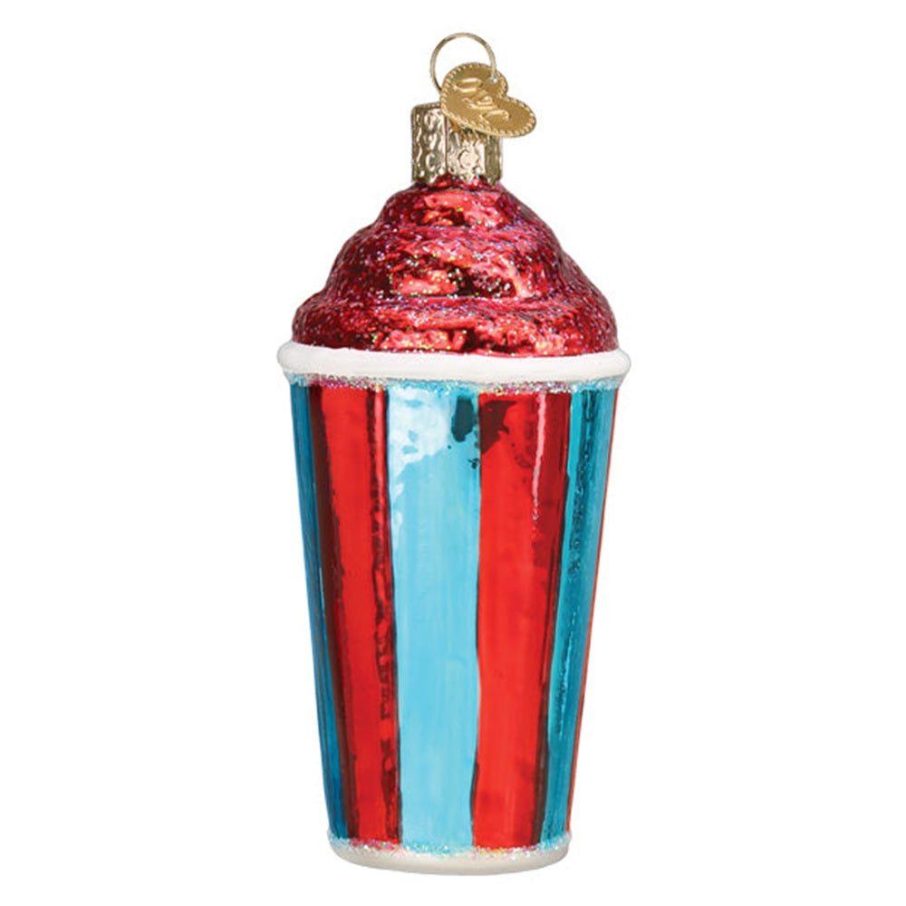 A novelty Christmas ornament shaped like a cup of iced coffee, featuring a red glittery swirl top, a red and blue striped cup with the word 'ICE' and a cartoon character, and a gold hanging loop on a white background.