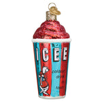 A novelty Christmas ornament shaped like a cup of iced coffee, featuring a red glittery swirl top, a red and blue striped cup with the word 'ICE' and a cartoon character, and a gold hanging loop on a white background.