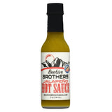Bottle of Beehive Brothers Jalapeño Hot Sauce on a white background