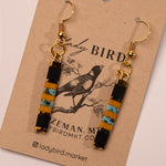 Jet Black Yellow and Gold Patterned Tila Bead Earrings - close up