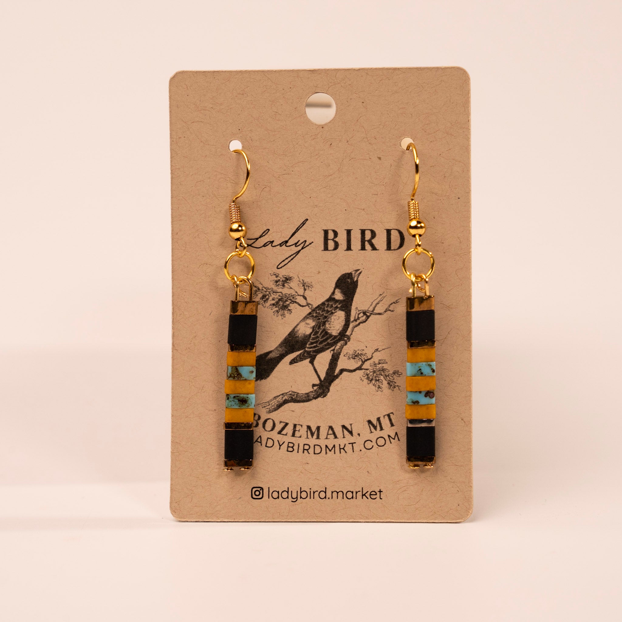 Jet Black Yellow and Gold Patterned Tila Bead Earrings