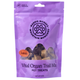 Purple package of Maddie McGee's Mountain Munchies pet treats with a paw print logo.